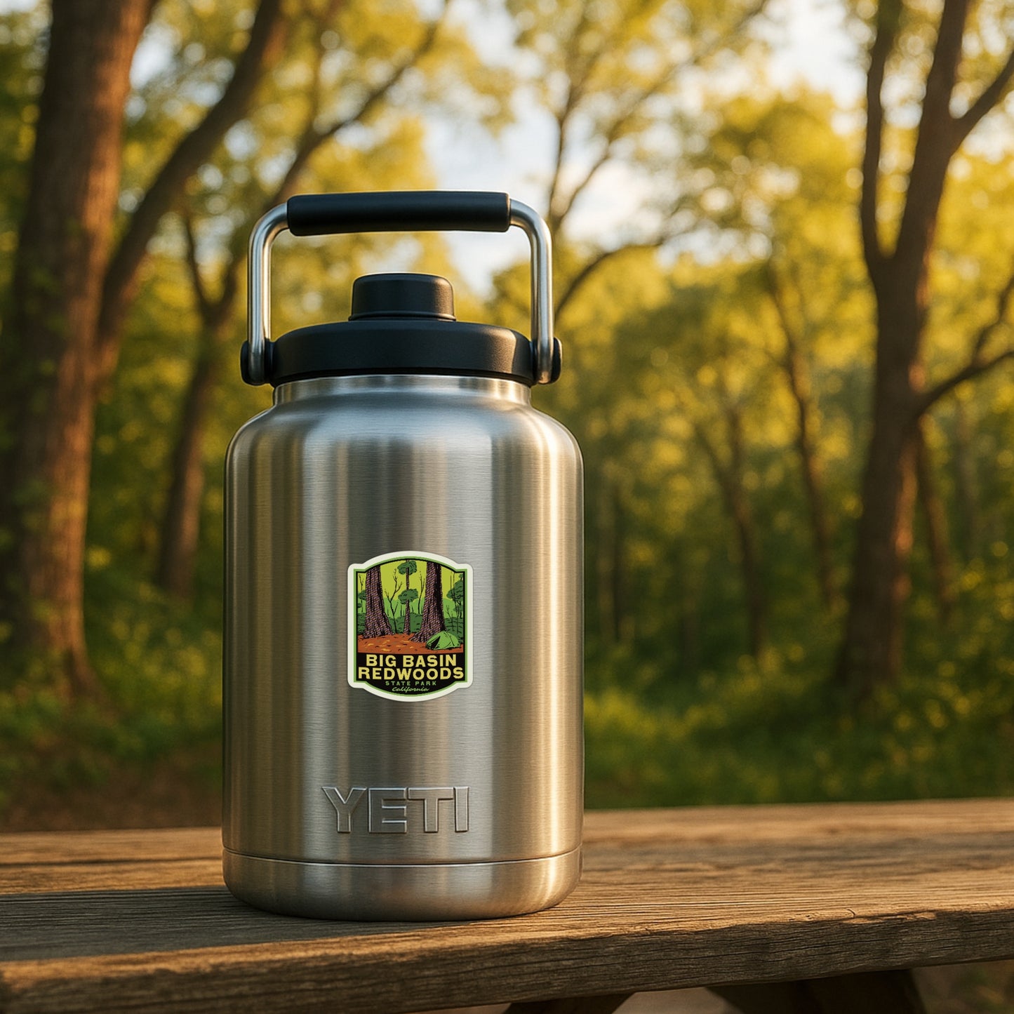 YETI insulated bottle with Big Basin Brewing Company logo on a wooden surface with a forest background