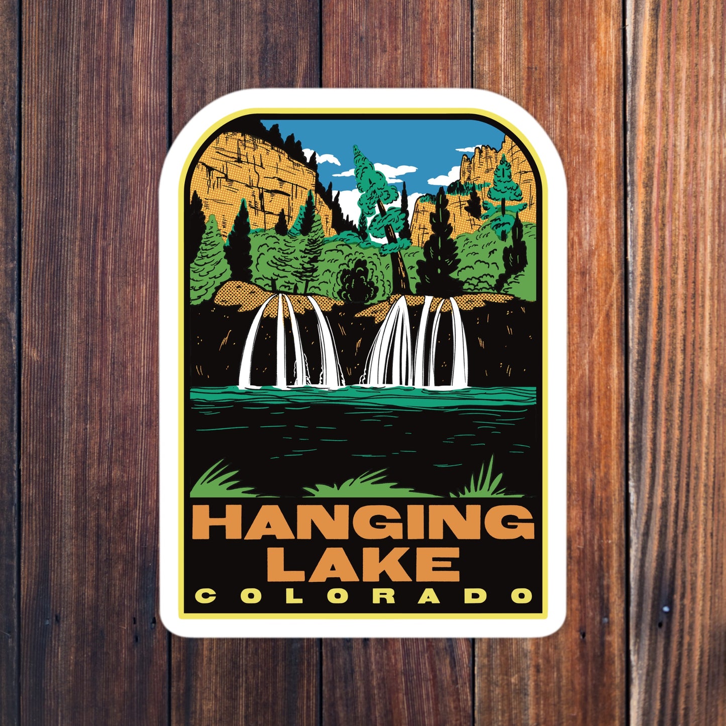 Sticker of Hanging Lake, Colorado with a scenic illustration on a wooden background