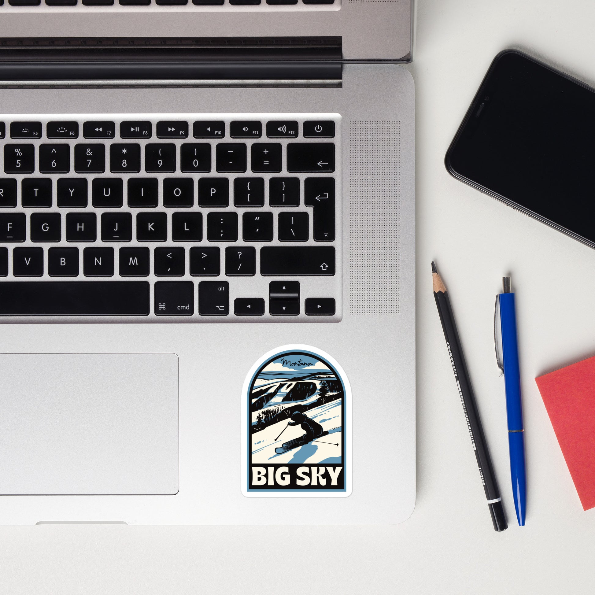 A sticker of Big Sky Montana on a laptop