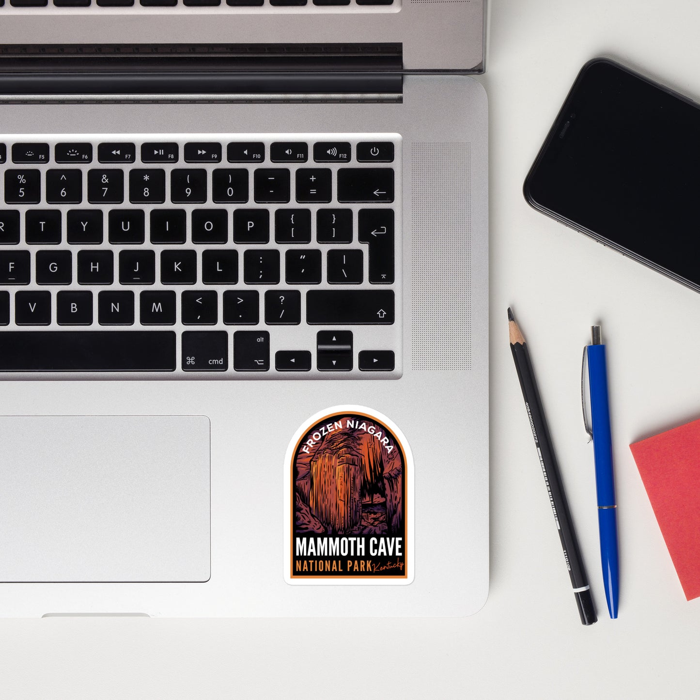 A sticker of Mammoth Cave National Park on a laptop