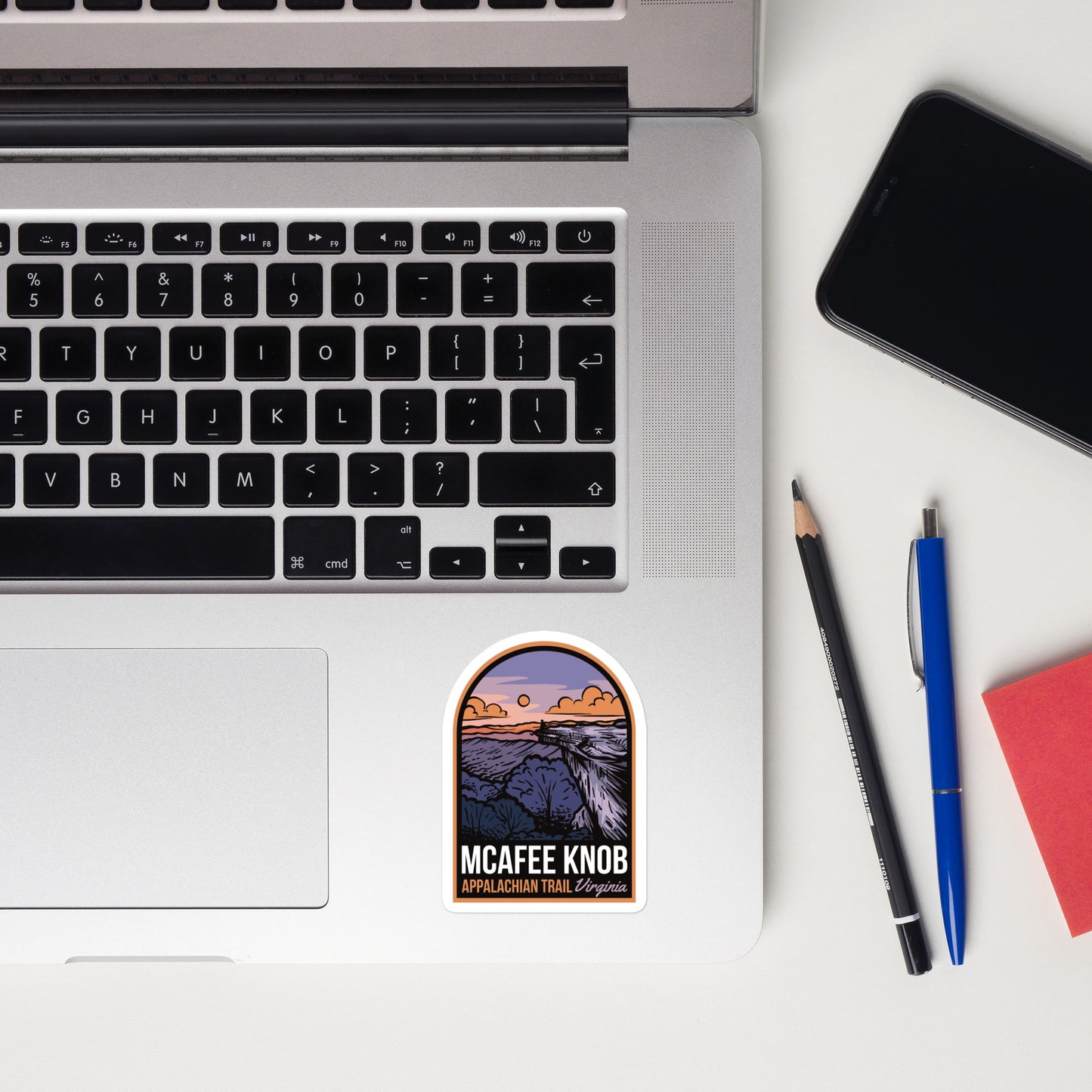 A sticker of McAfee Knob Virginia on a laptop