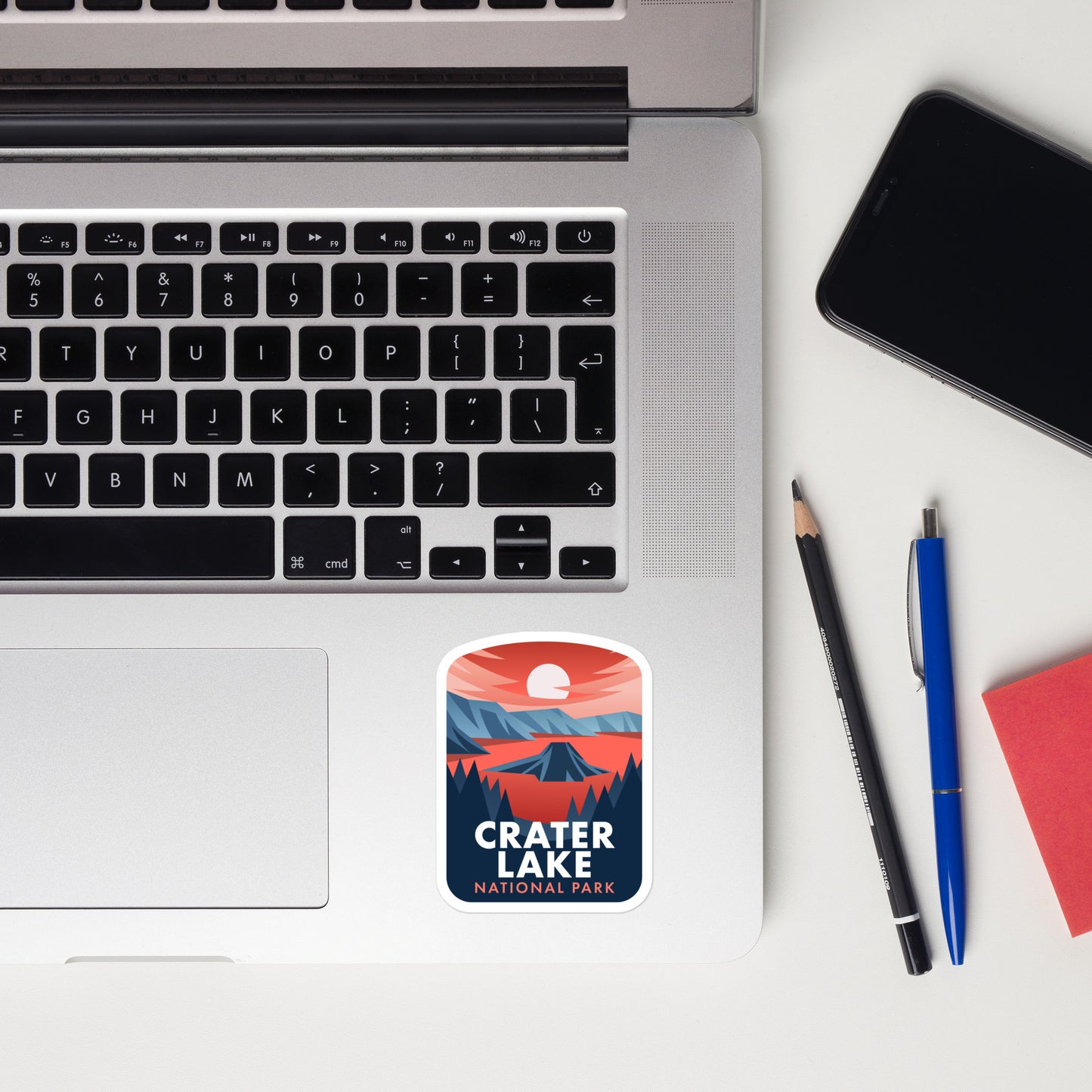 A sticker of Crater Lake National Park on a laptop