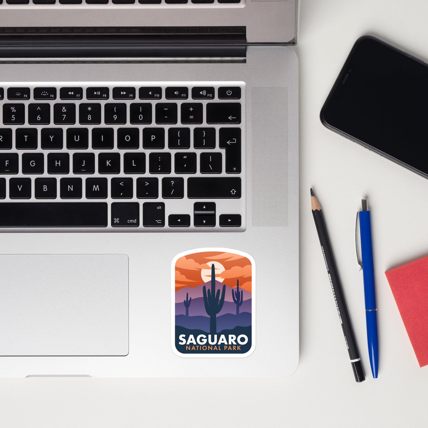 A sticker of Saguaro National Park on a laptop