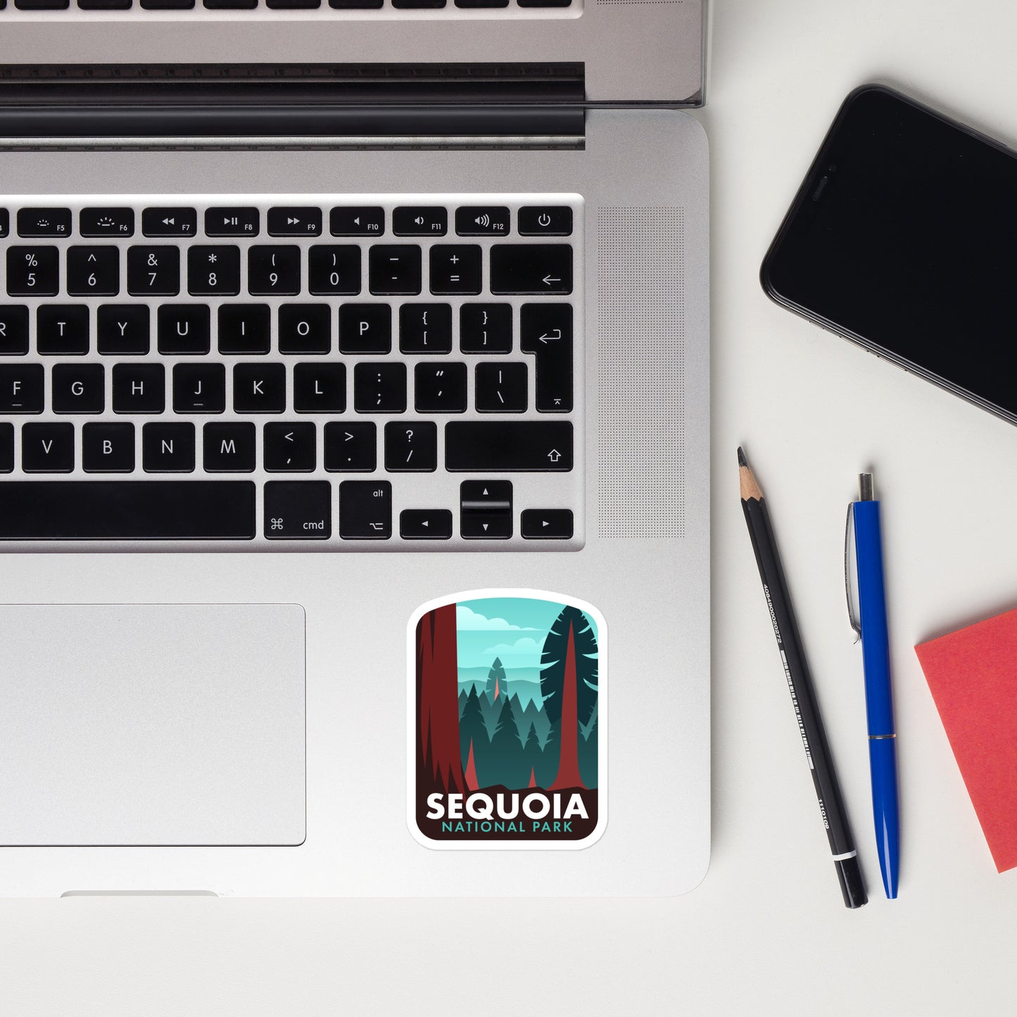 A sticker of Sequoia National Park on a laptop