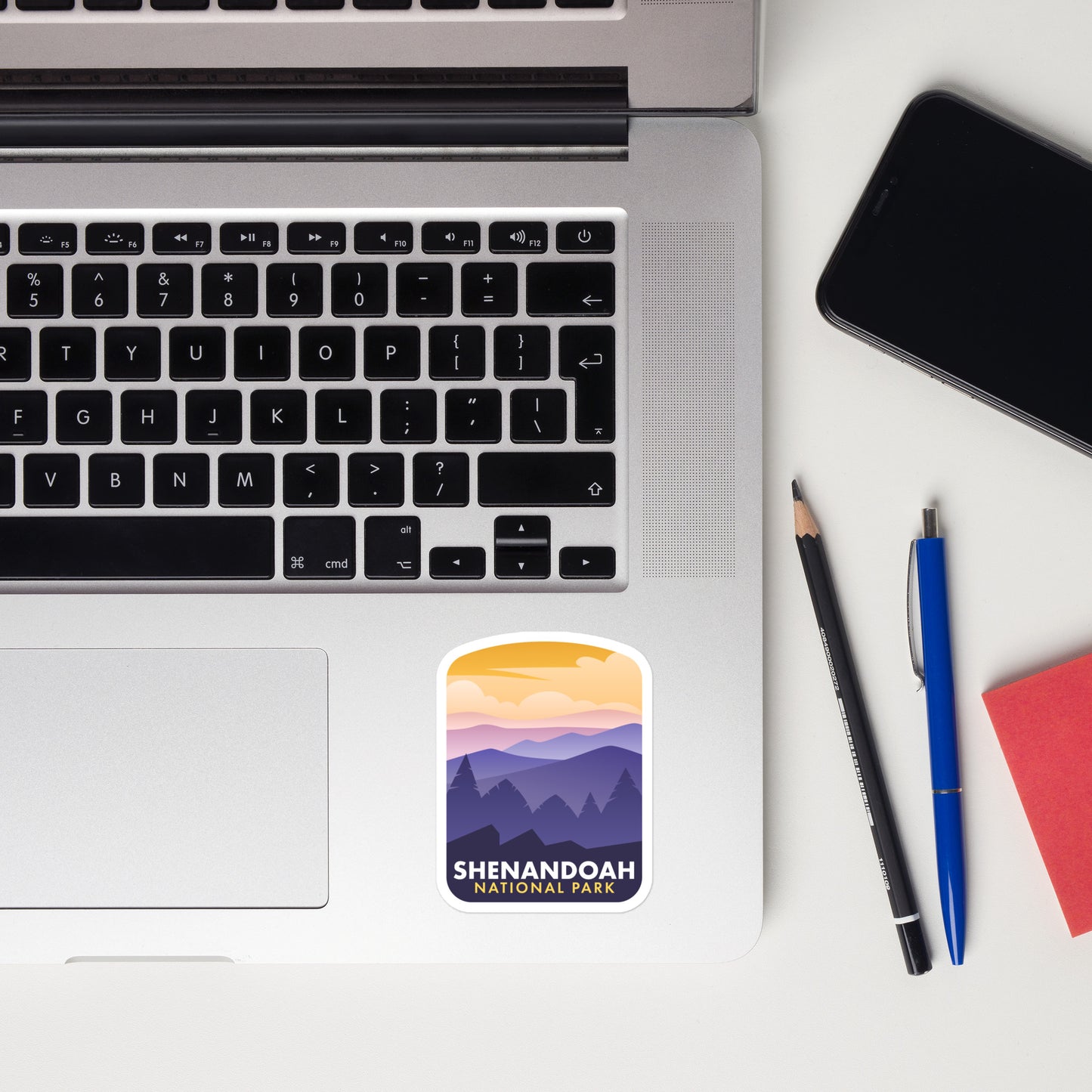A sticker of Shenandoah National Park on a laptop