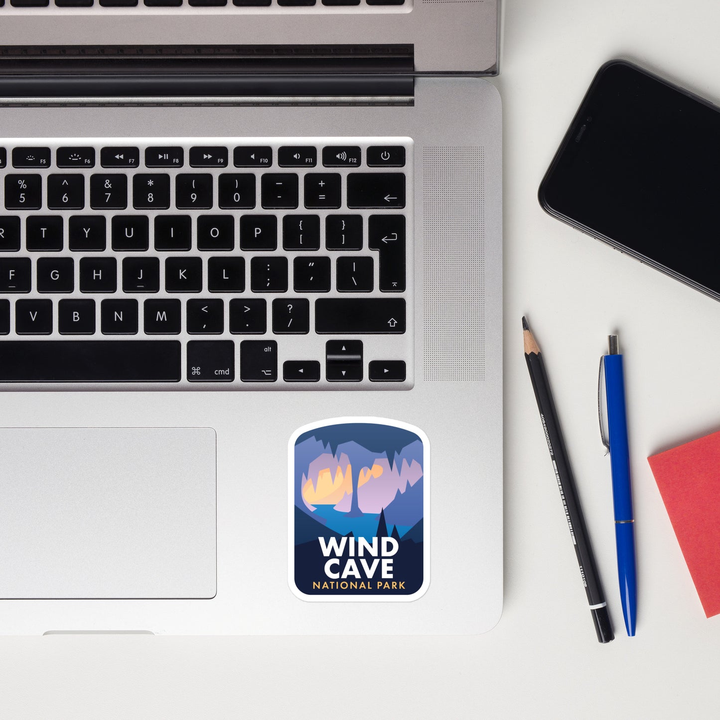 A sticker of Wind Cave National Park on a laptop