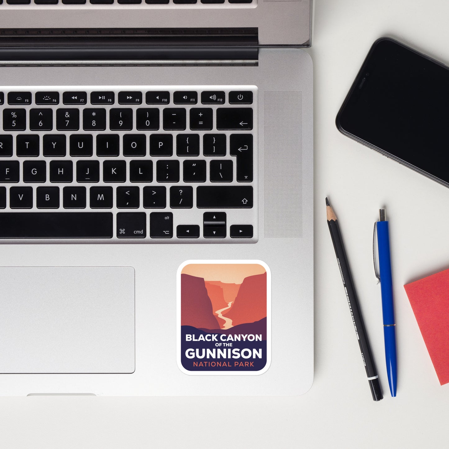 A sticker of Black Canyon of the Gunnsion on a laptop
