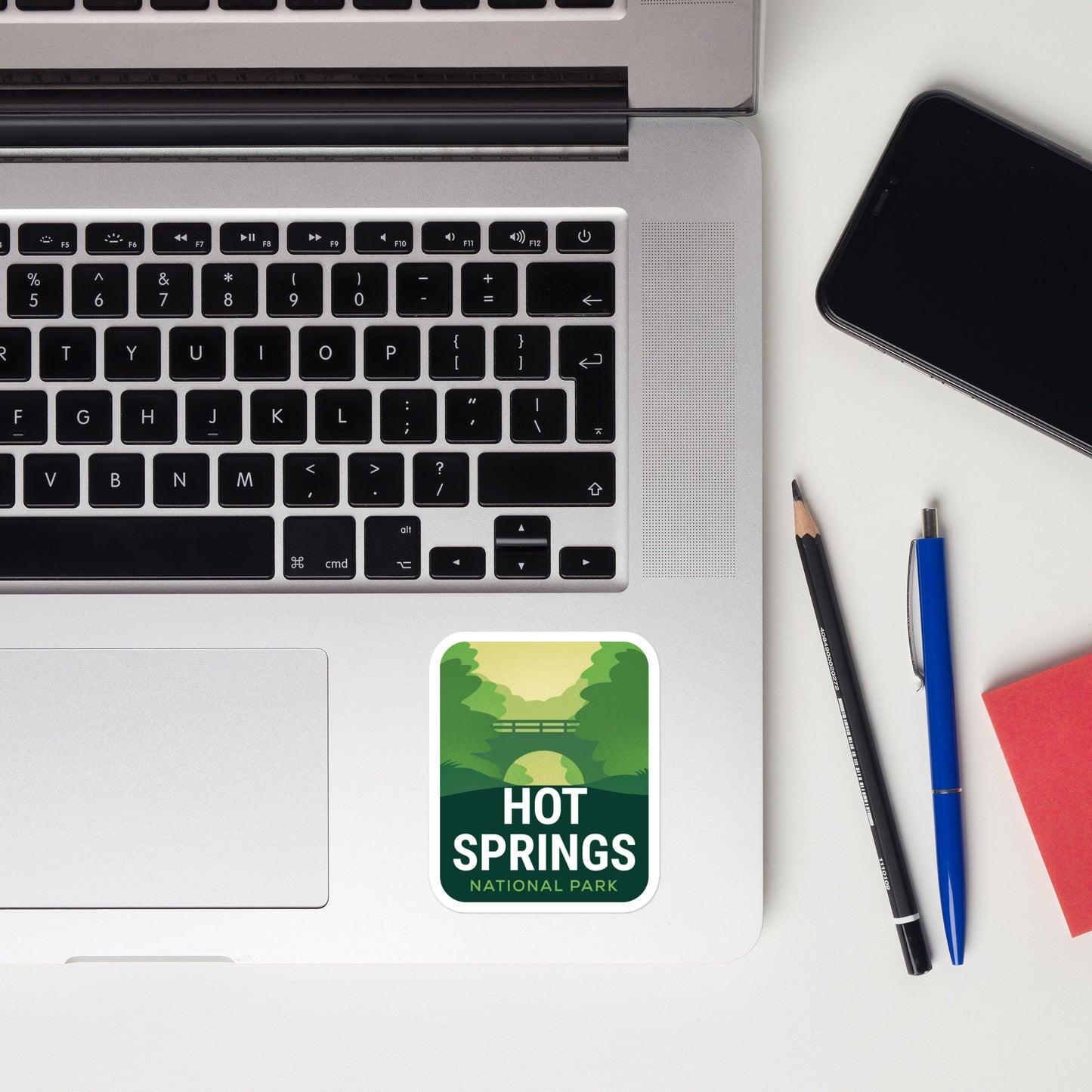 A sticker of Hot Springs National Park on a laptop