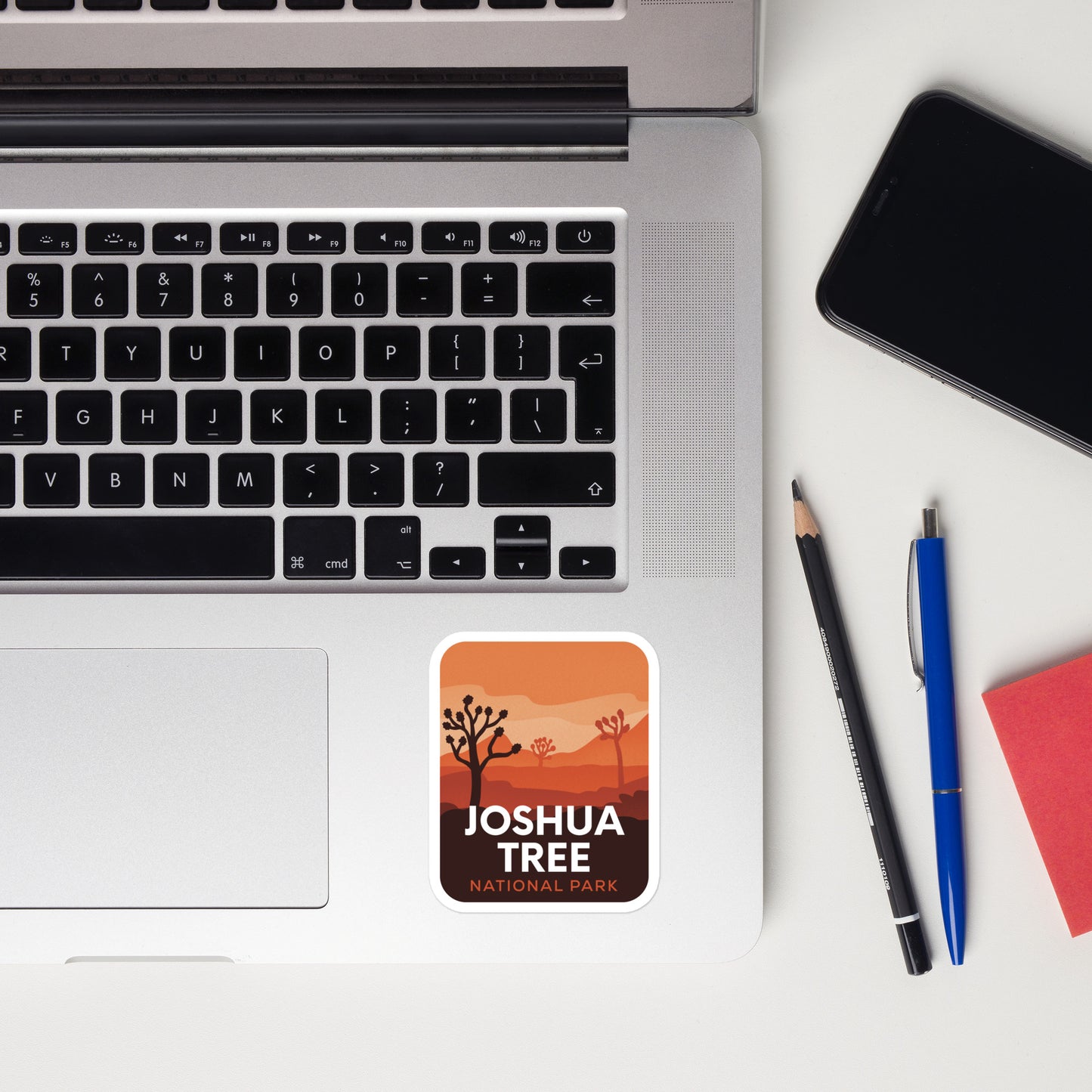 A sticker of Joshua Tree National Park on a laptop