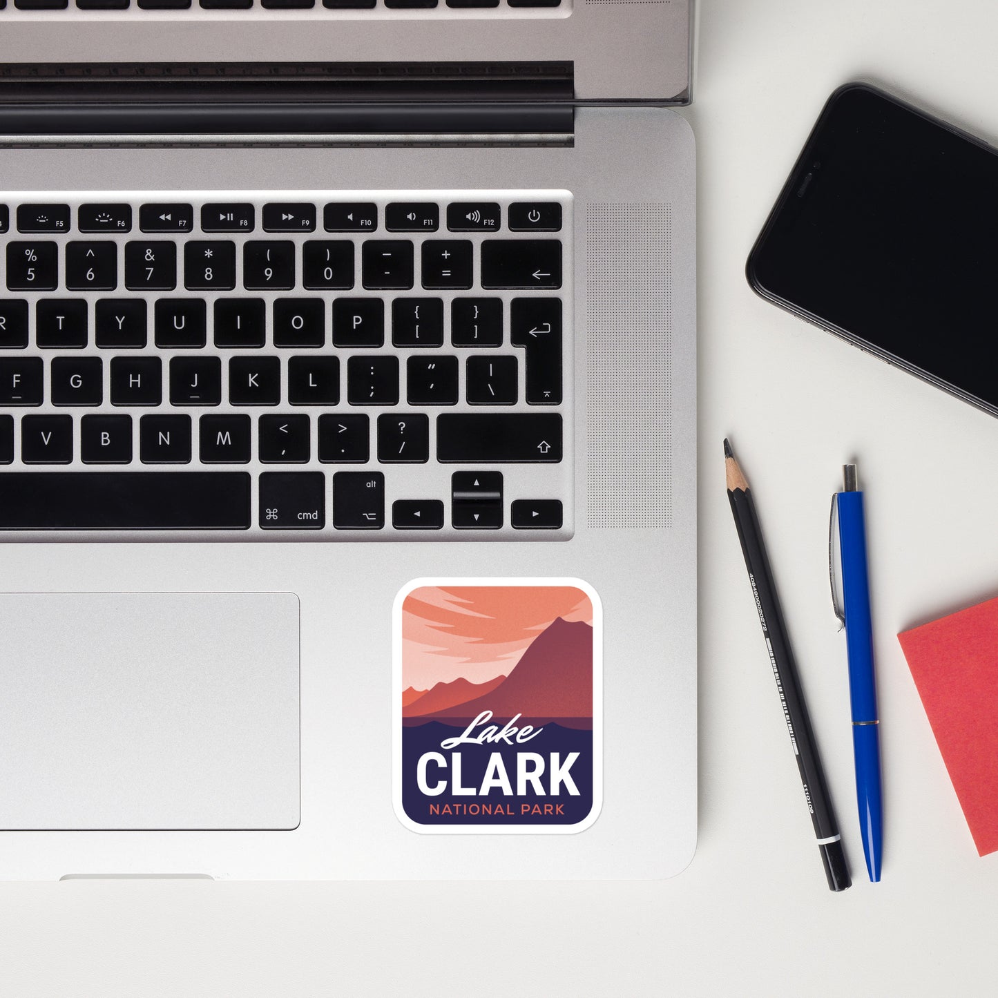 A sticker of Lake Clark National Park on a laptop