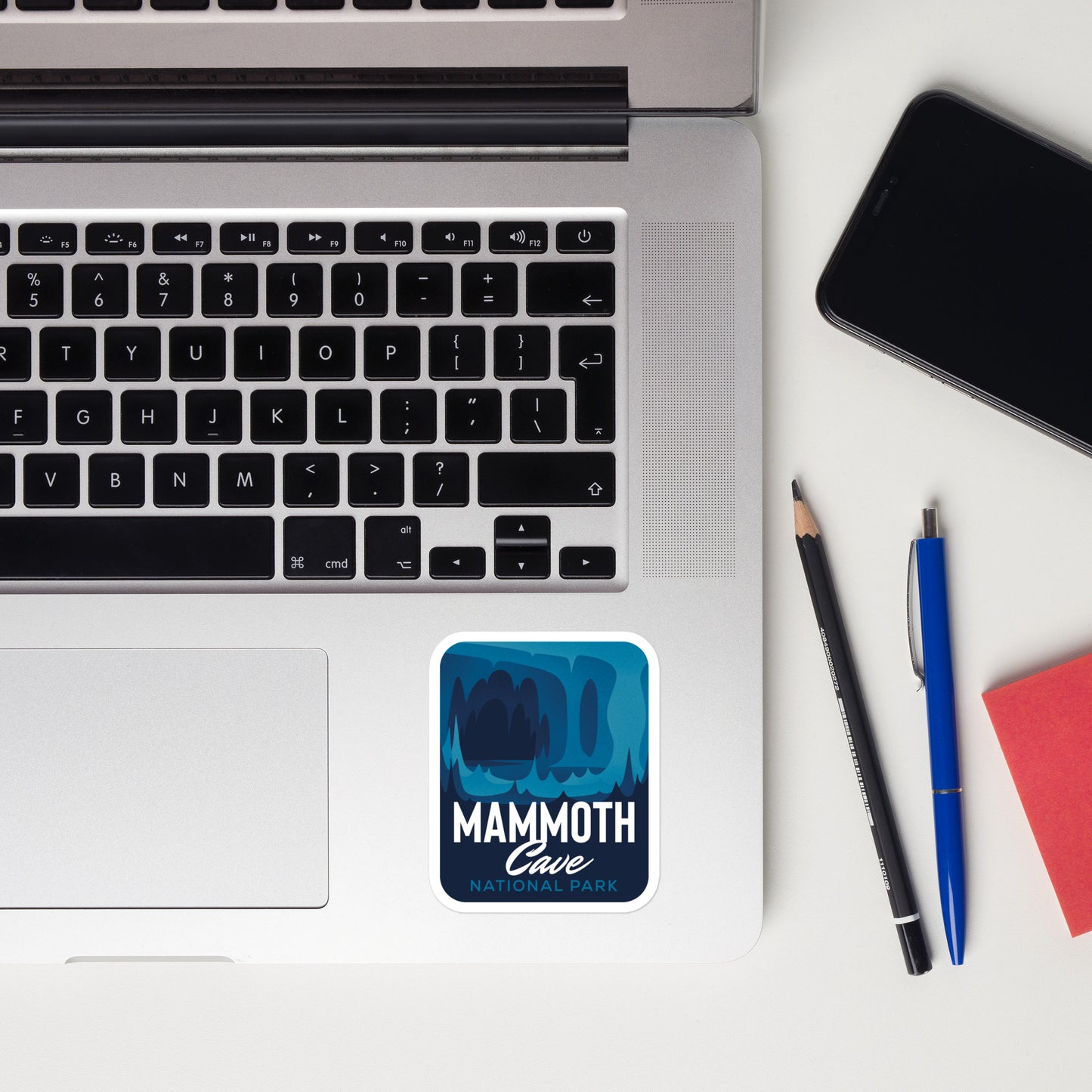 A sticker of Mammoth Cave National Park on a laptop