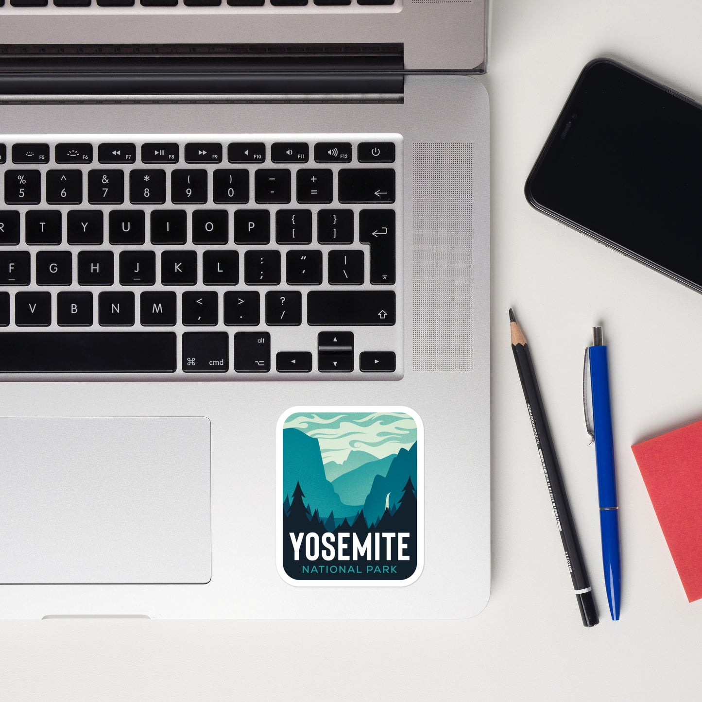 A sticker of Yosemite National Park on a laptop