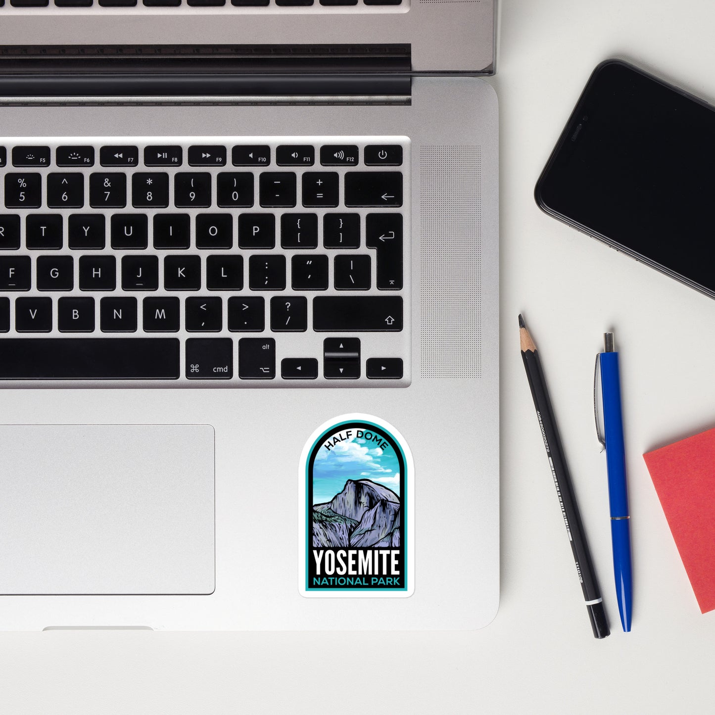 A sticker of Yosemite National Park on a laptop