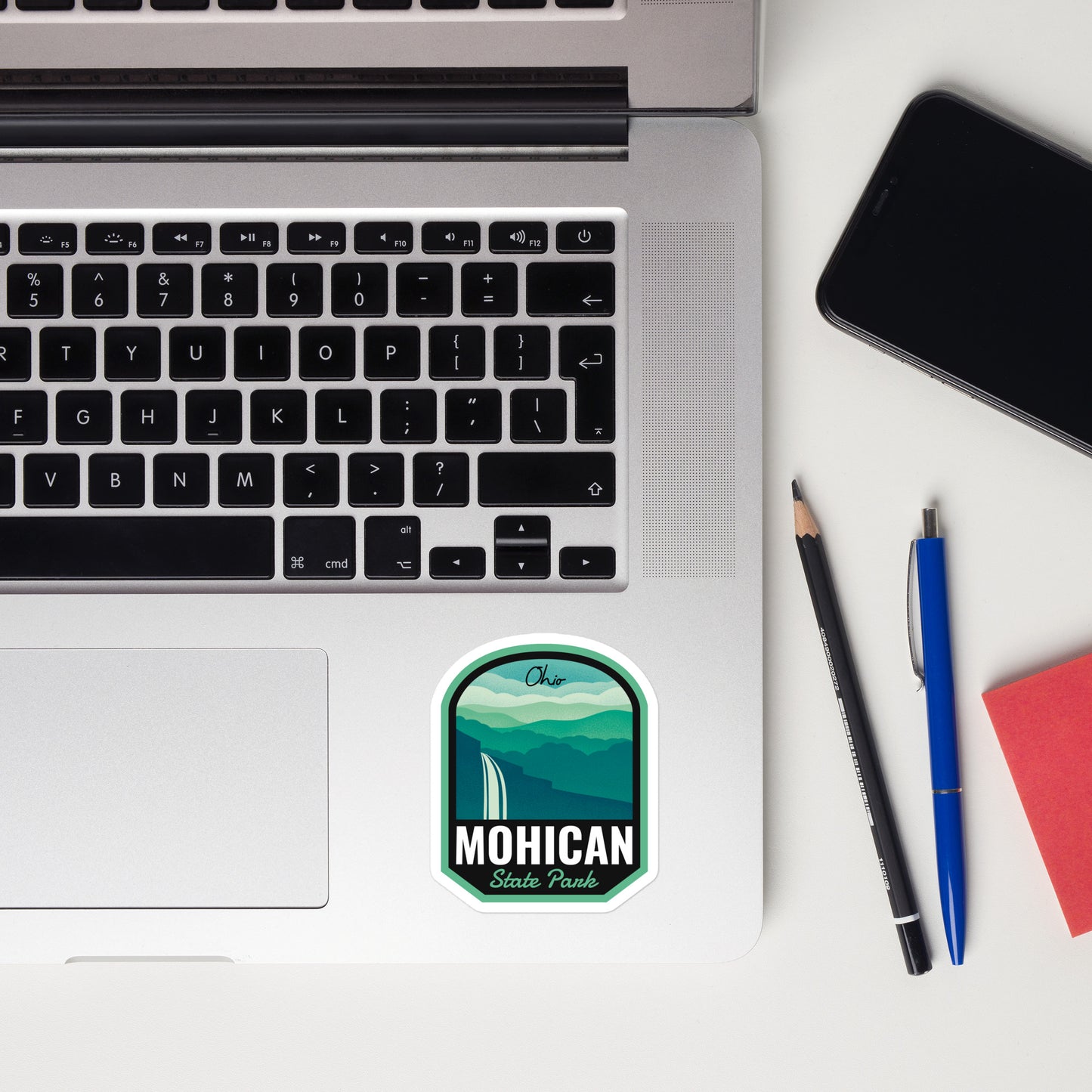 A sticker of Mohican State Park on a laptop