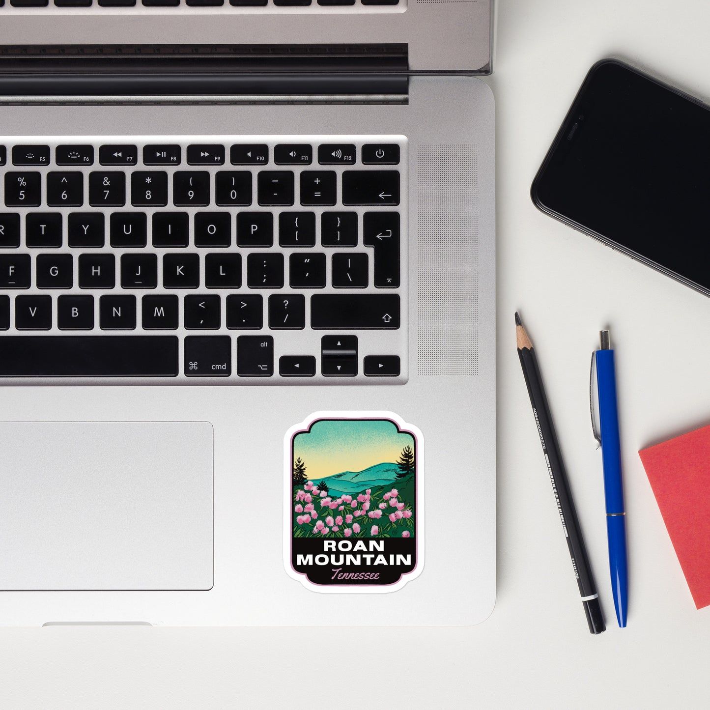 A sticker of Roan Mountain Tennessee on a laptop