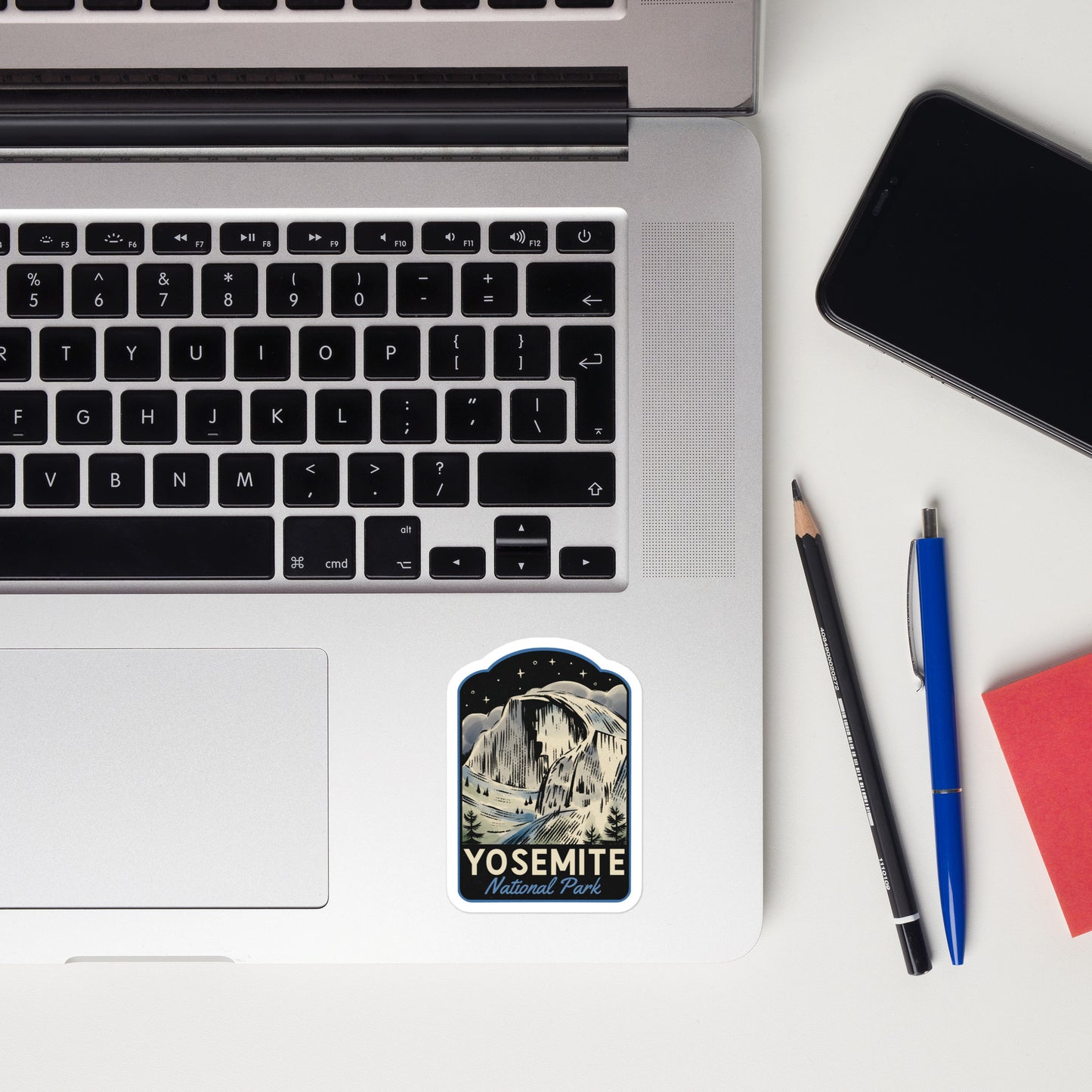 A sticker of Yosemite National Park on a laptop