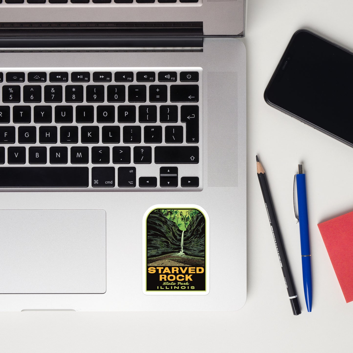 A sticker of Starved Rock State Park on a laptop