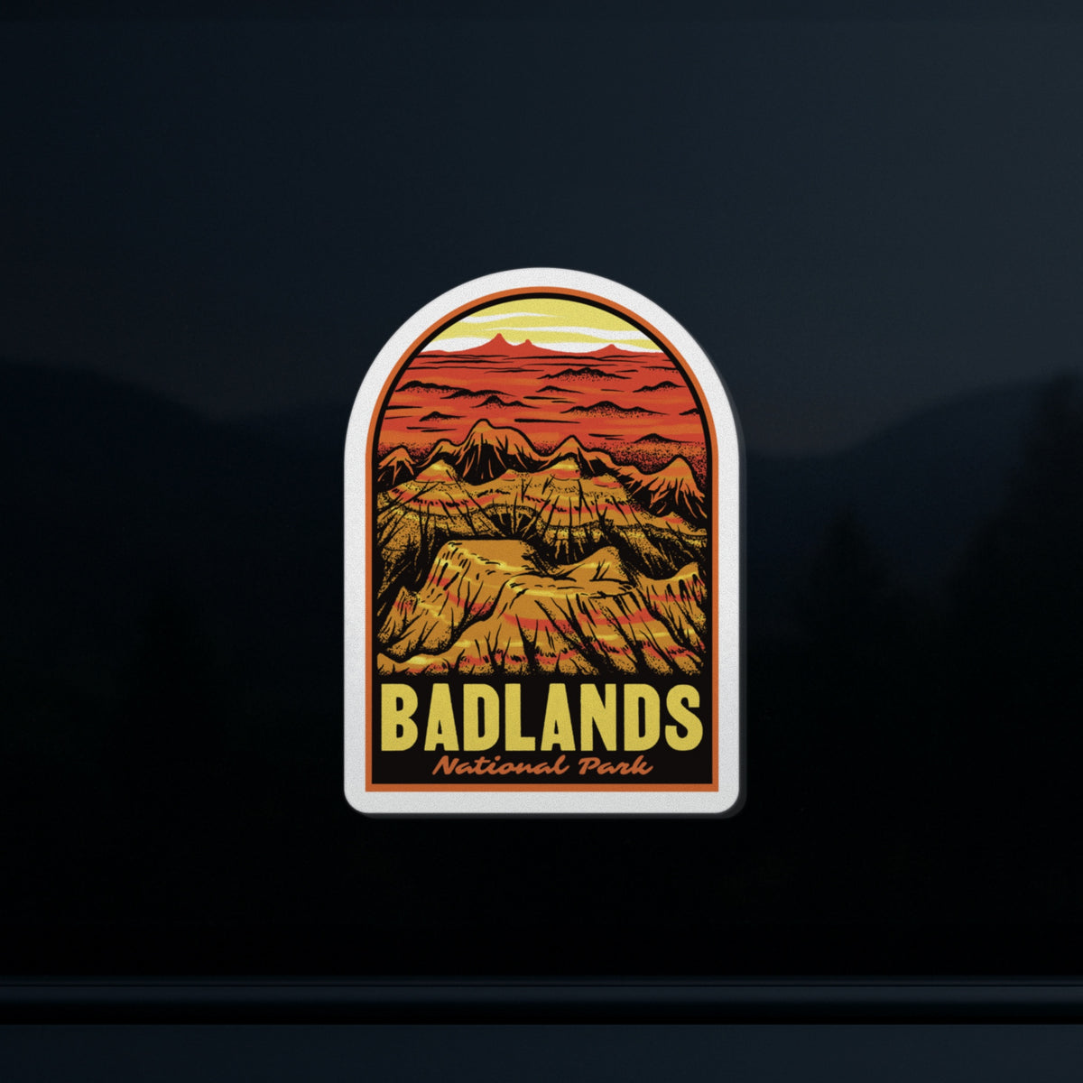 a sticker of Badlands National Park on a car window