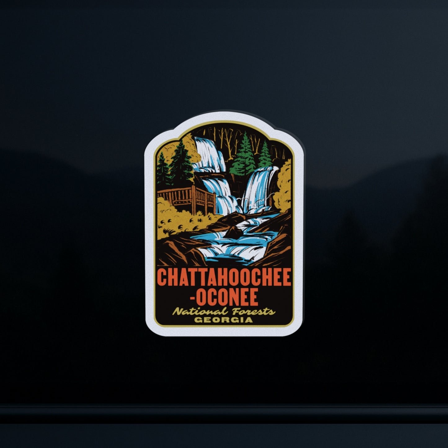 Sticker with a scenic design of waterfalls and text on a dark background