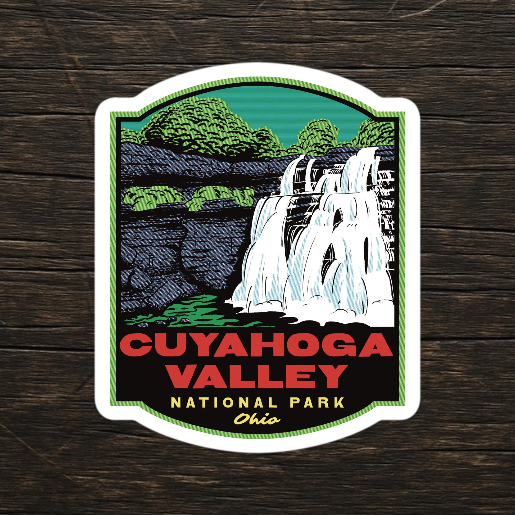 A sticker of Cuyahoga Valley National Park on a wood table
