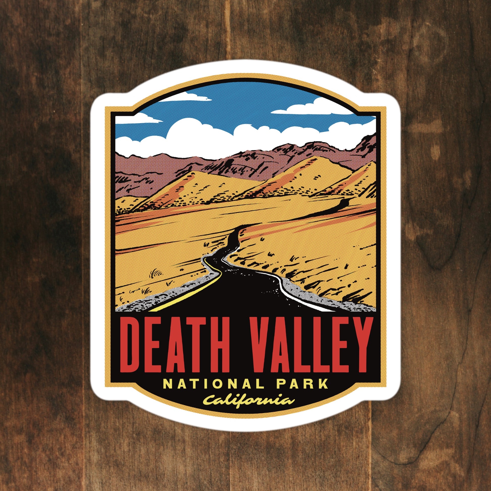 A sticker of Death Valley National Park on a wood surface
