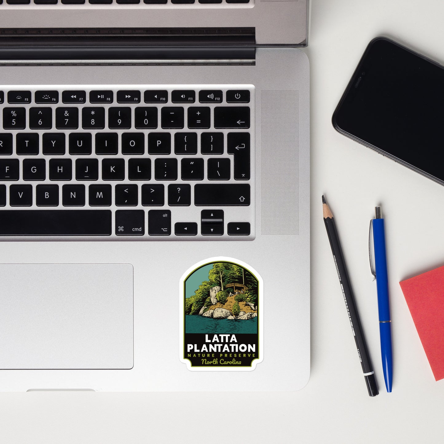 A sticker of Latta Nature Preserve on a laptop