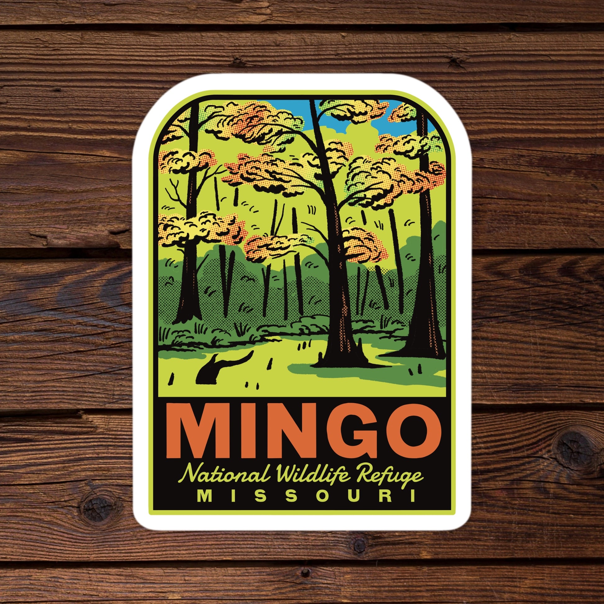 A sticker of Mingo National Wildlife Refuge on a wood background