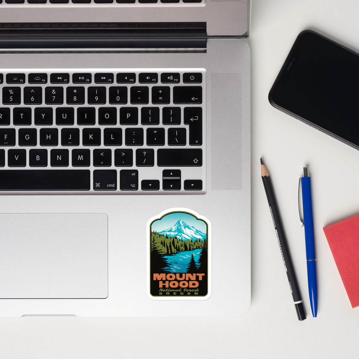 a sticker of Mount Hood National Forest on a laptop