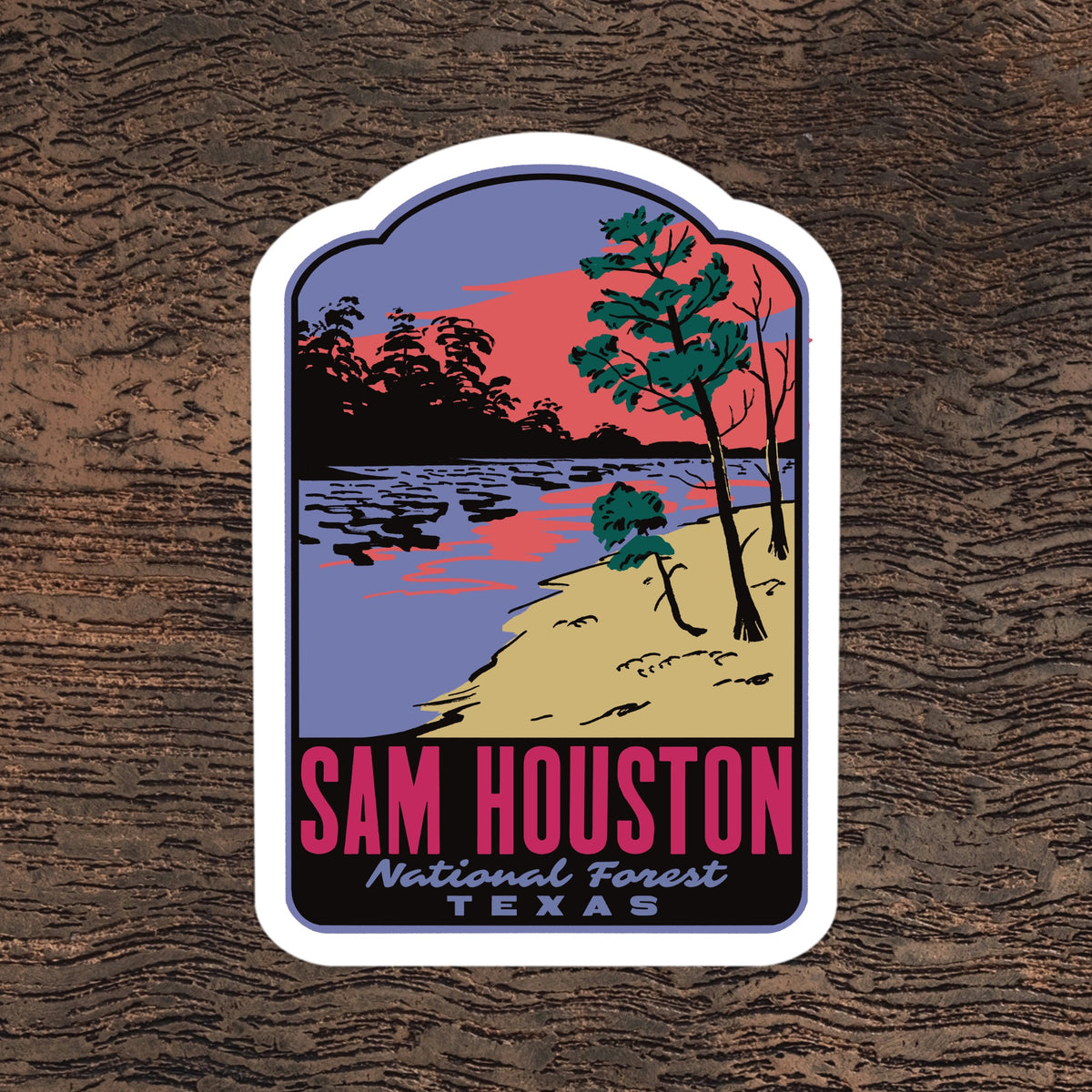 A sticker of Sam Houston National Forest on a wooden background