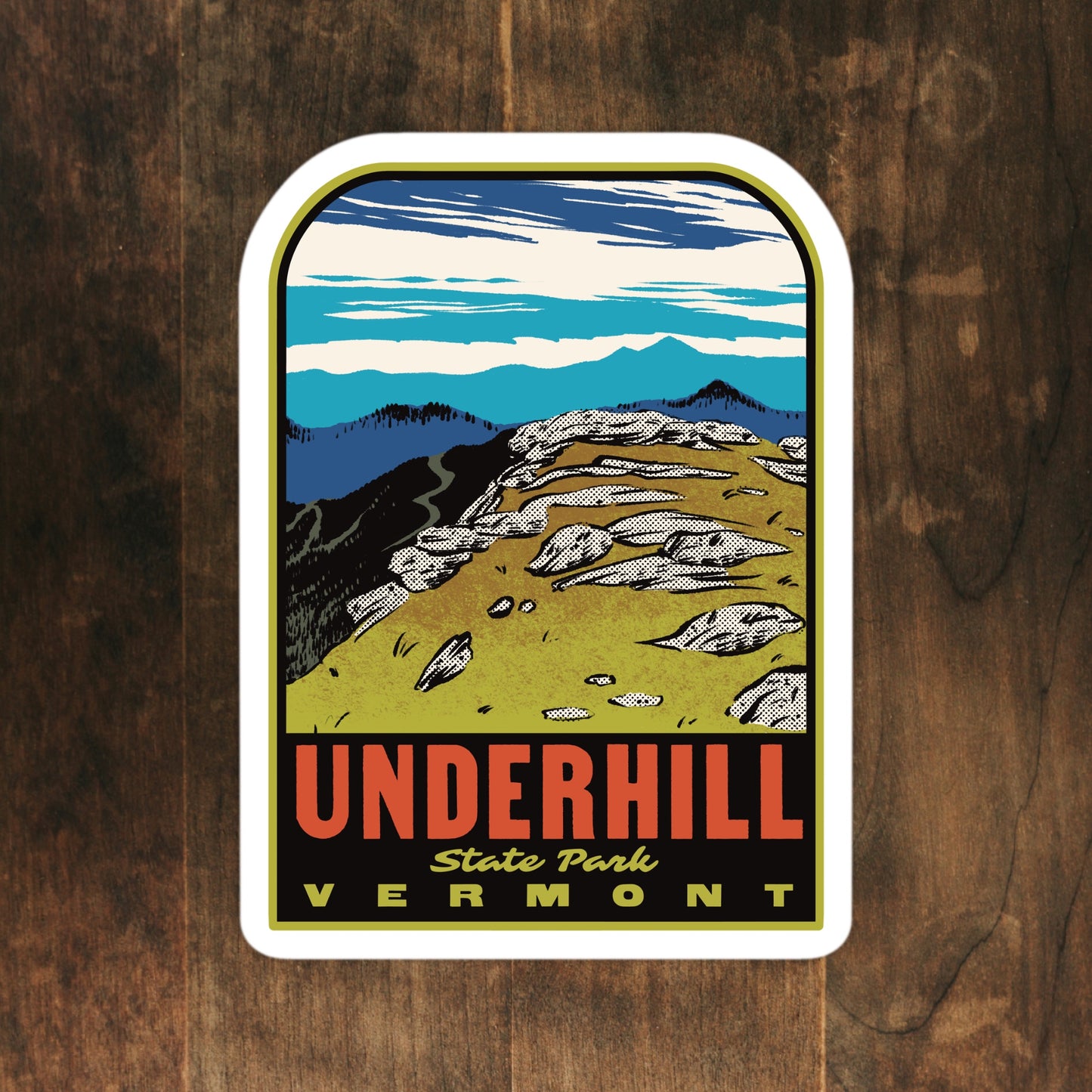 Sticker of Underhill State Park, Vermont with mountain landscape design on a wooden background