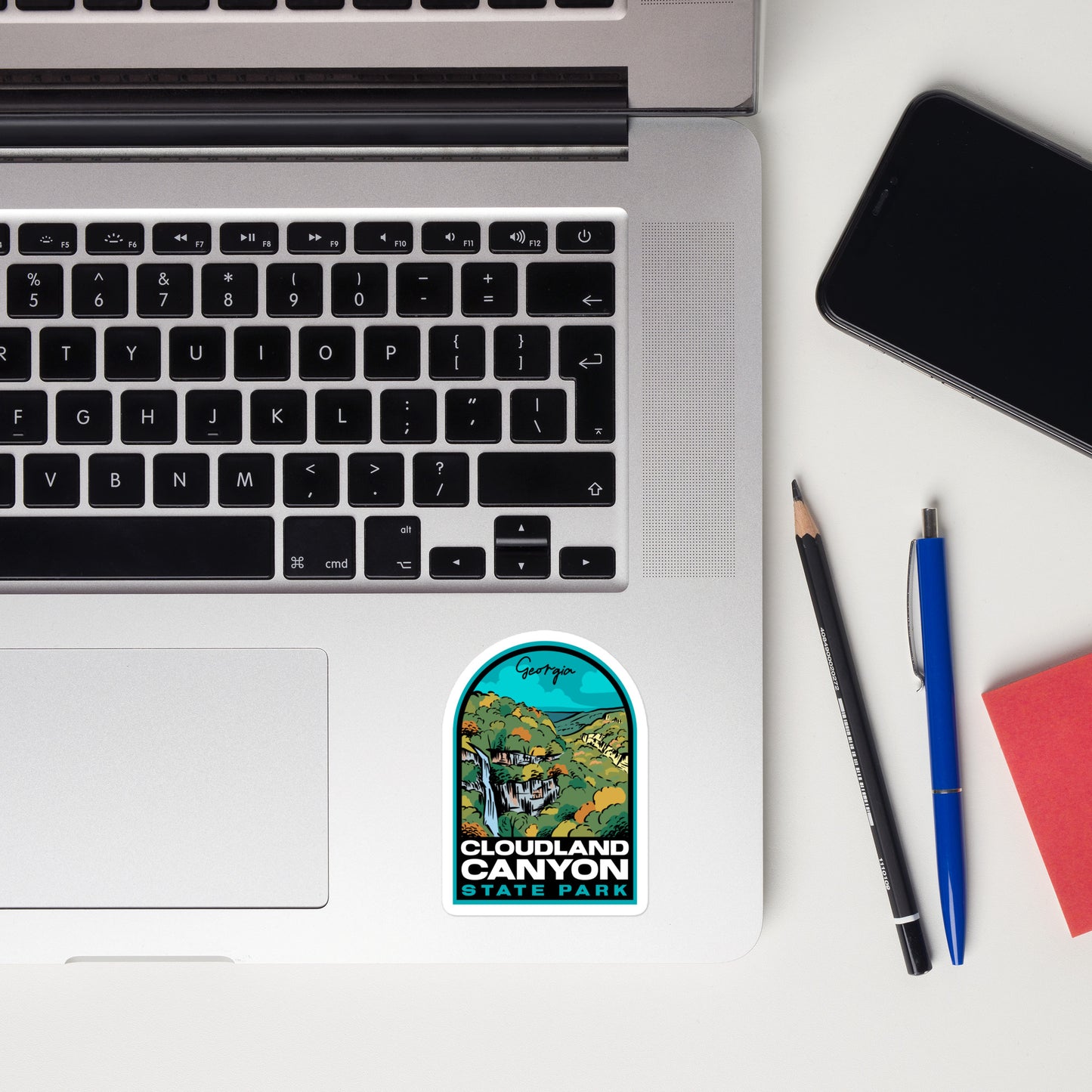 A sticker of Cloudland Canyon State Park on a laptop