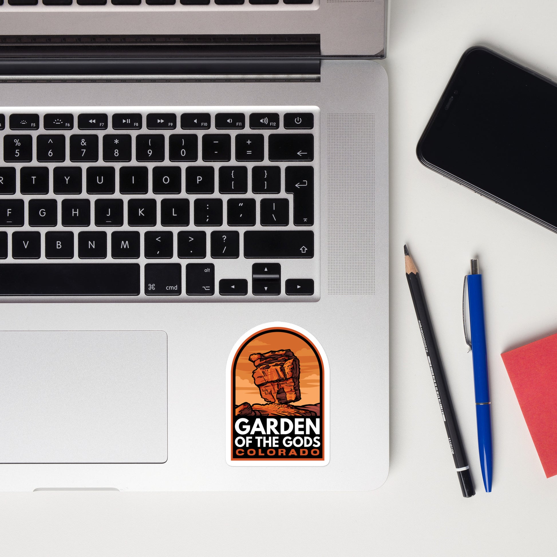 A sticker of Garden of the Gods Colorado on a laptop