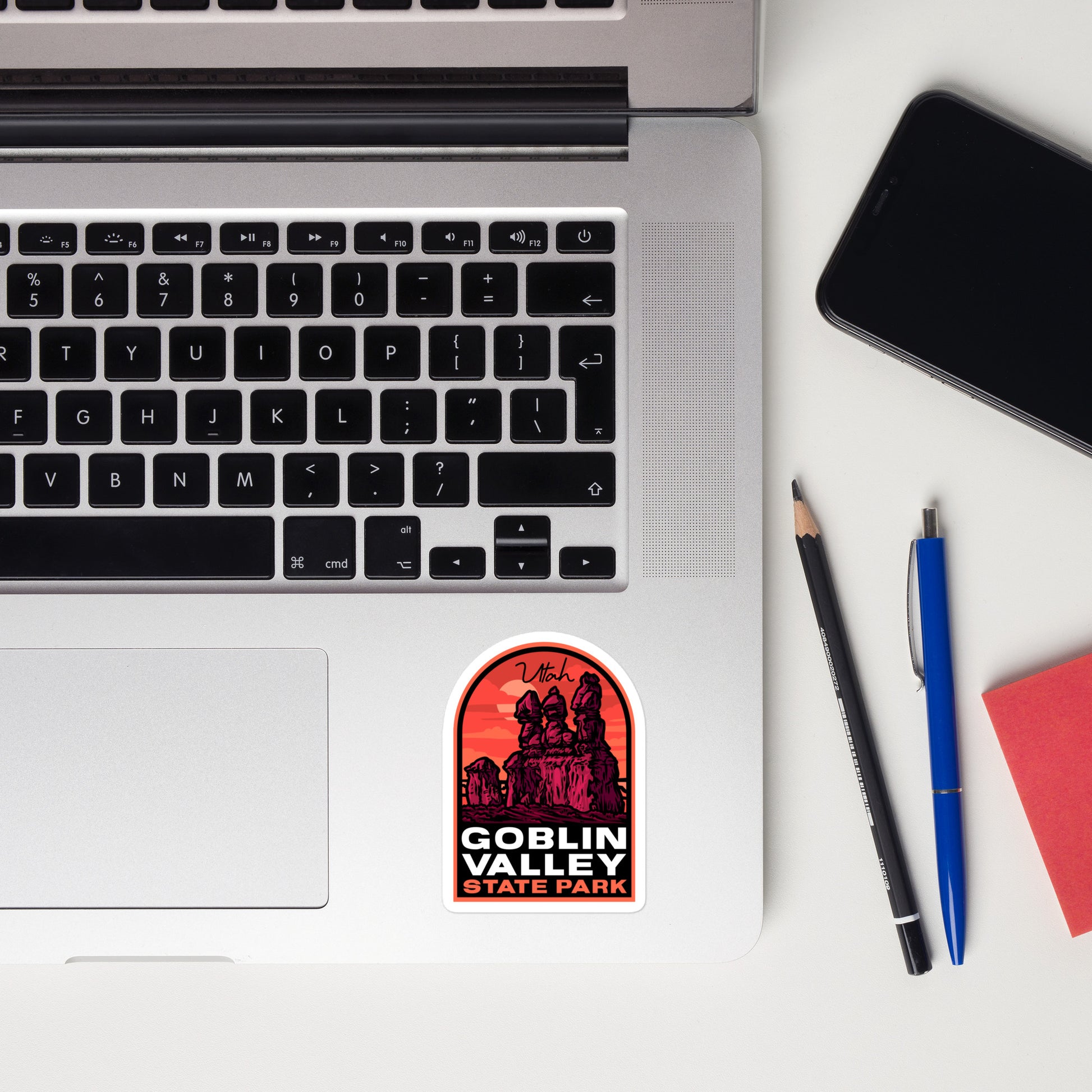 A sticker of Goblin Valley State Park on a laptop