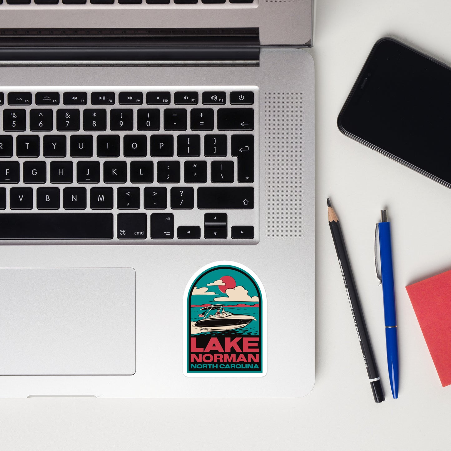 A sticker of Lake Norman NC on a laptop