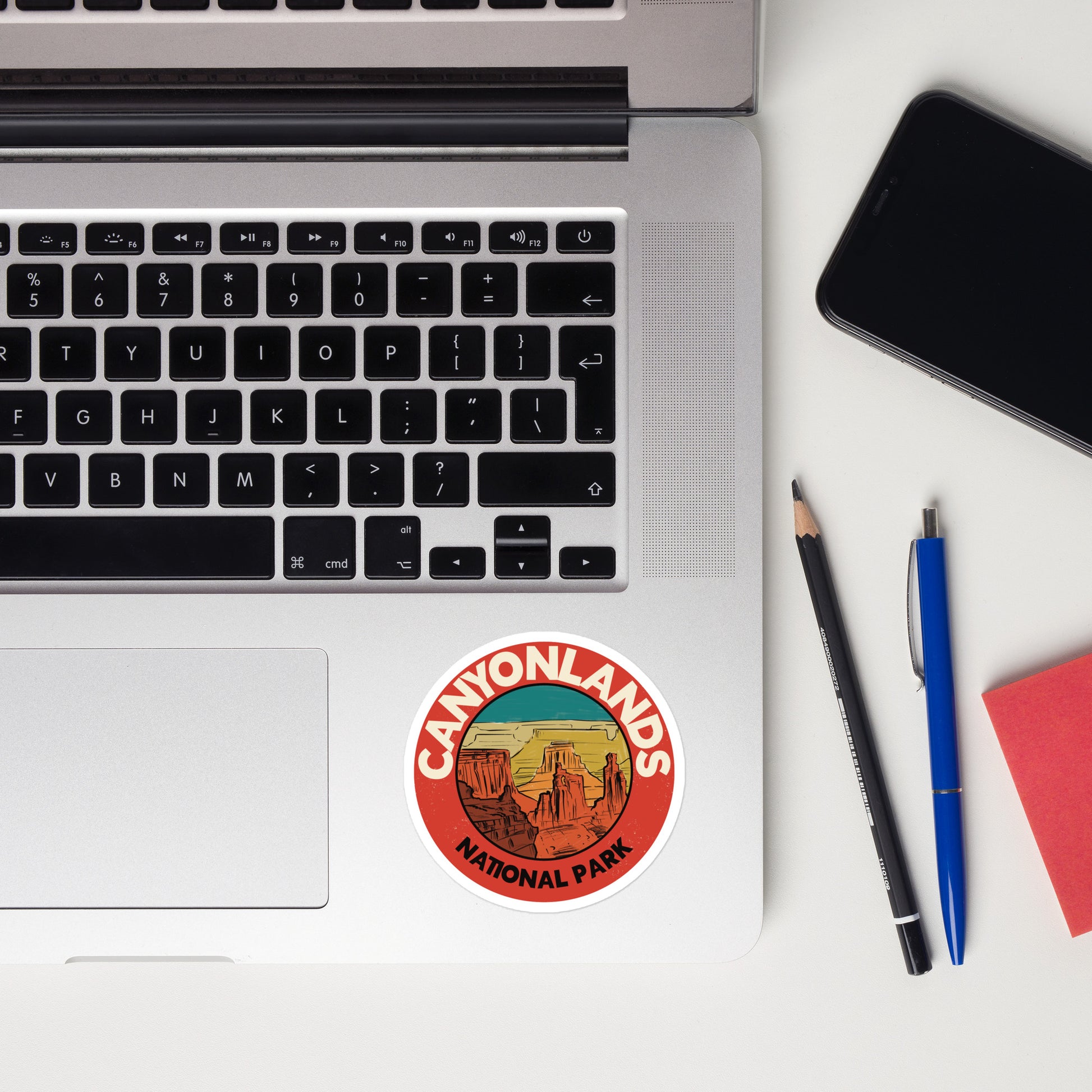 A sticker of Canyonlands National Park on a laptop