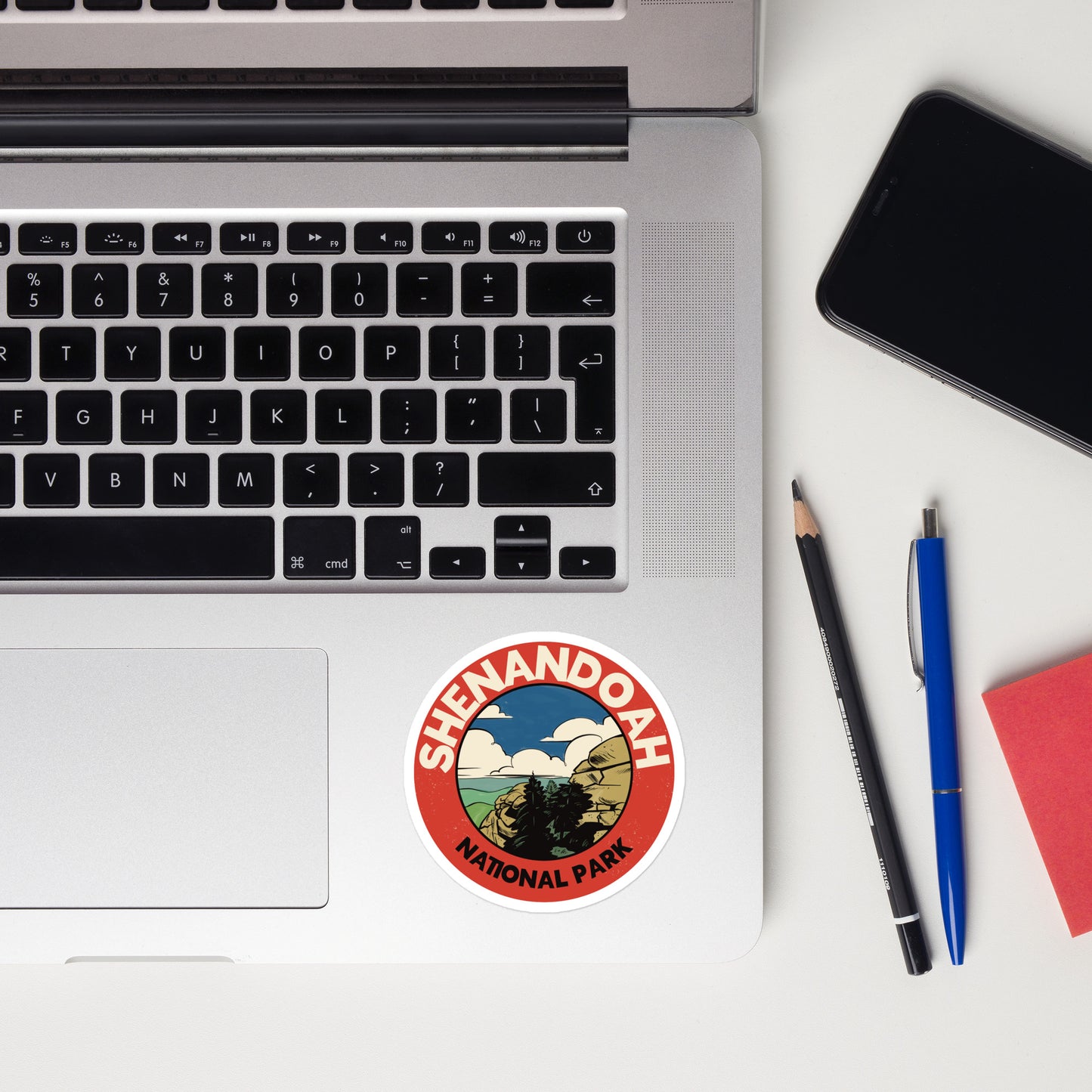 A sticker of Shenandoah National Park on a laptop