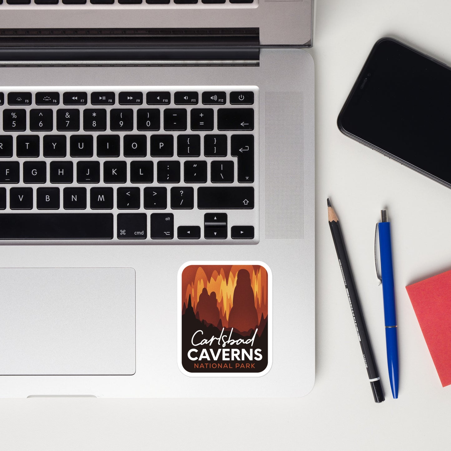 A sticker of Carlsbad Caverns National Park on a laptop