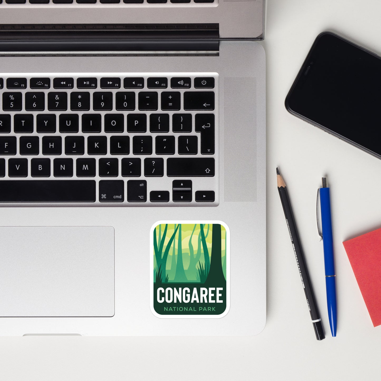 A sticker of Congaree National Park on a laptop