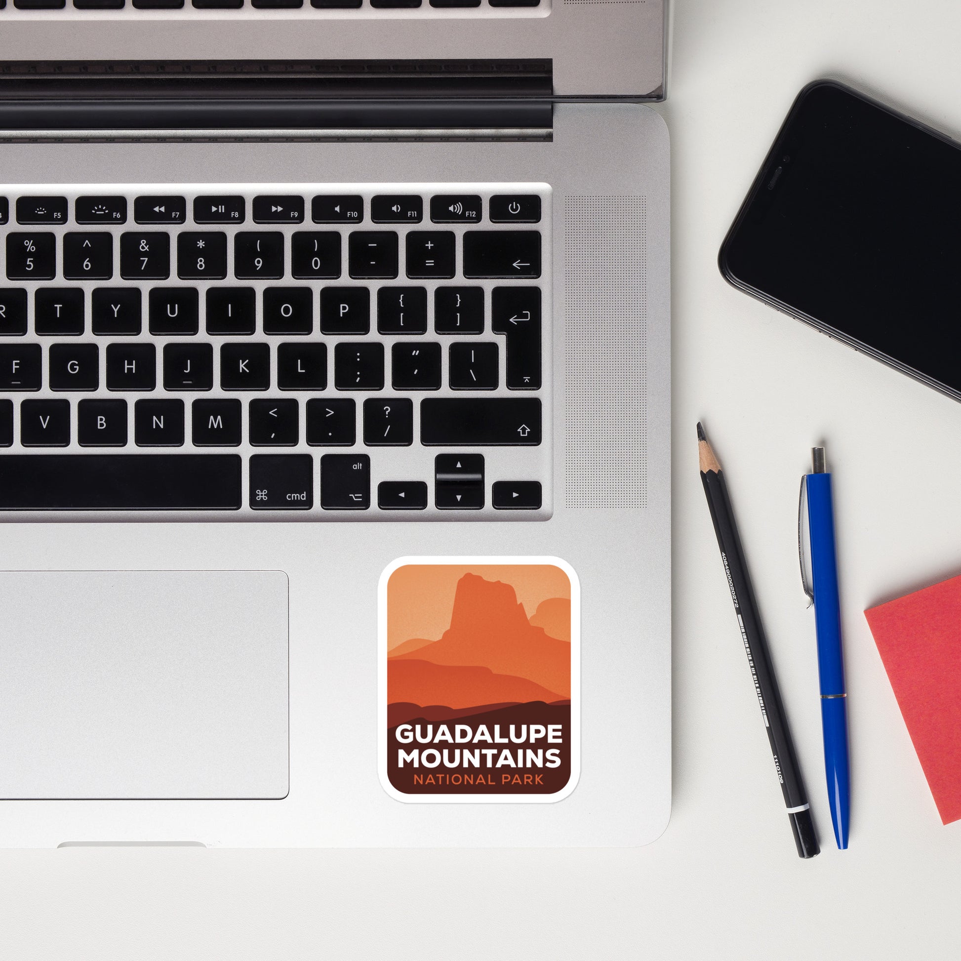 A sticker of Guadalupe Mountains National Park on a laptop