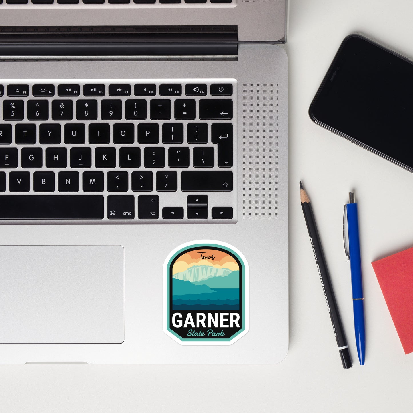 A sticker of Garner State Park on a laptop