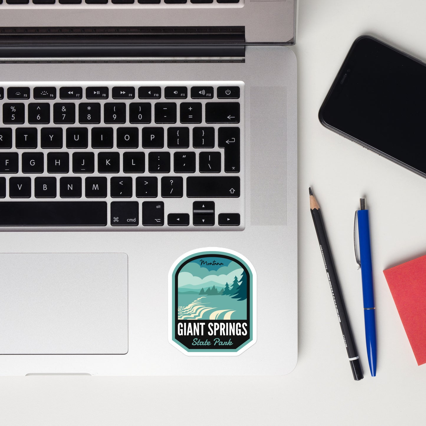 A sticker of Giant Springs State Park on a laptop