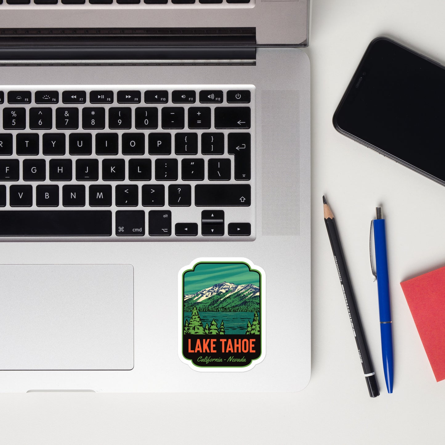 A sticker of Lake Tahoe on a laptop