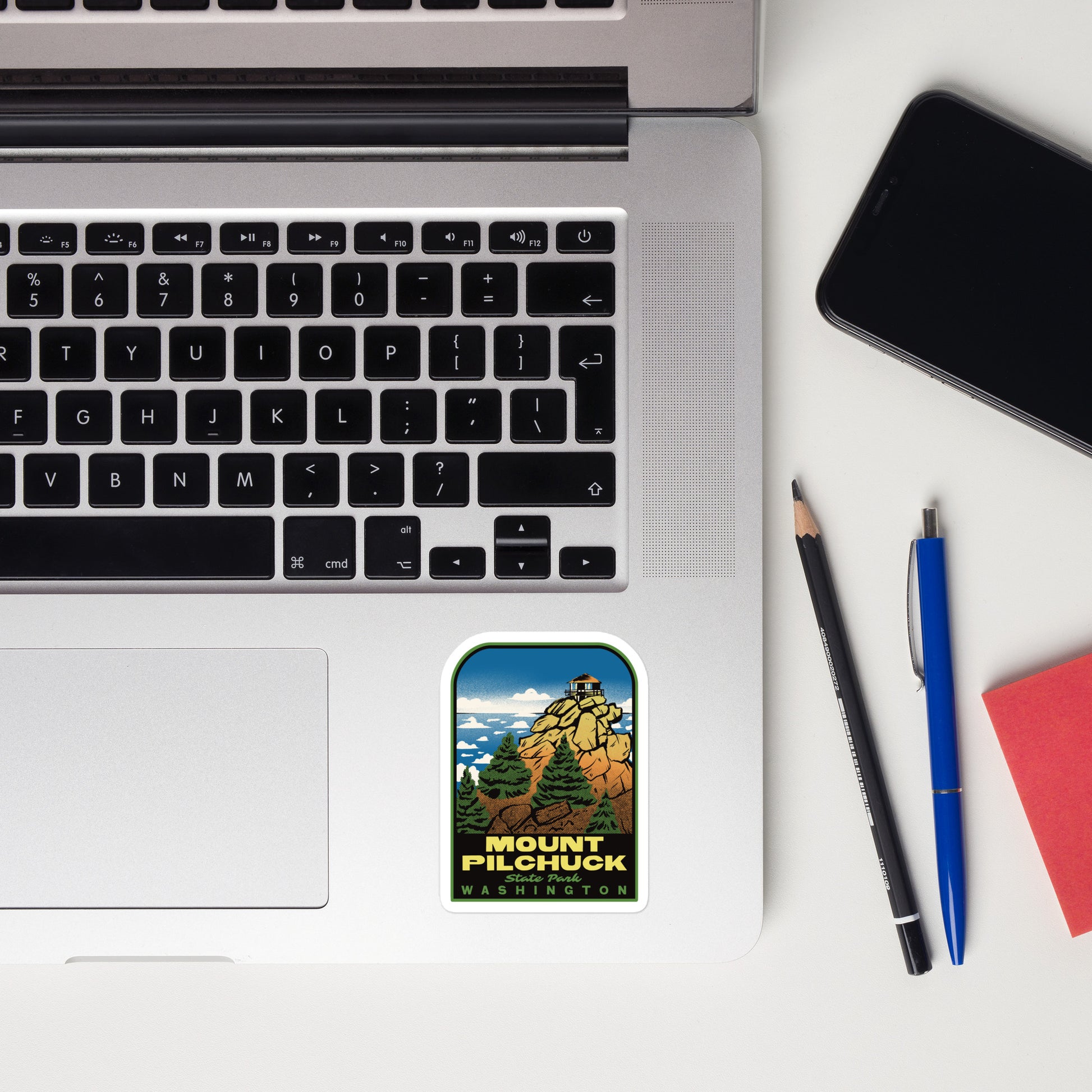 A sticker of Mount Pilchuck State Park Washington on a laptop
