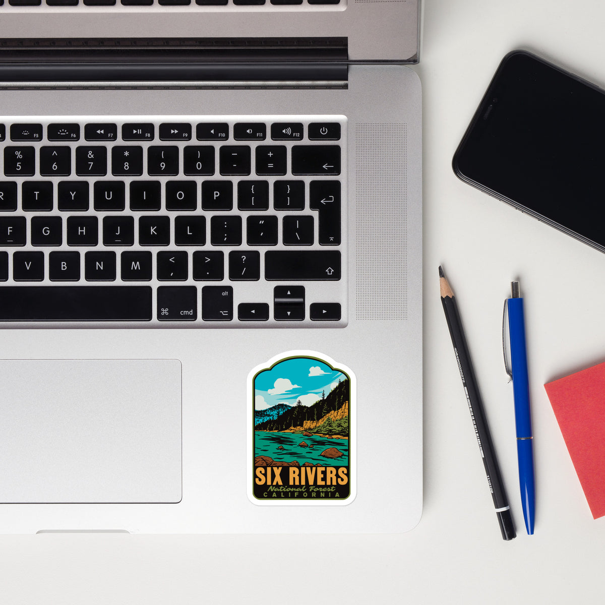 a sticker that reads "Six Rivers National Forest California" on a white background